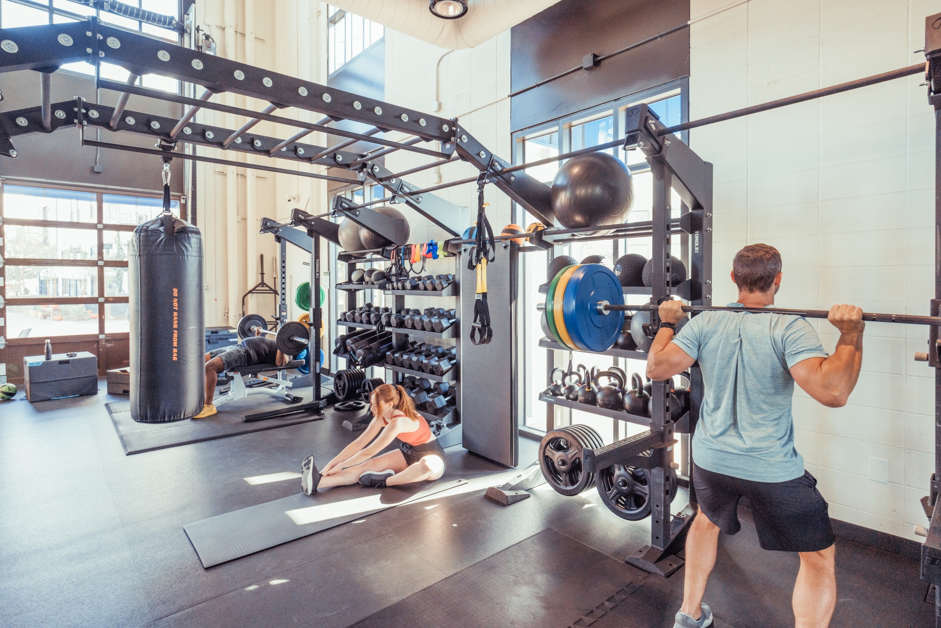 Residents working out in the fitness center
